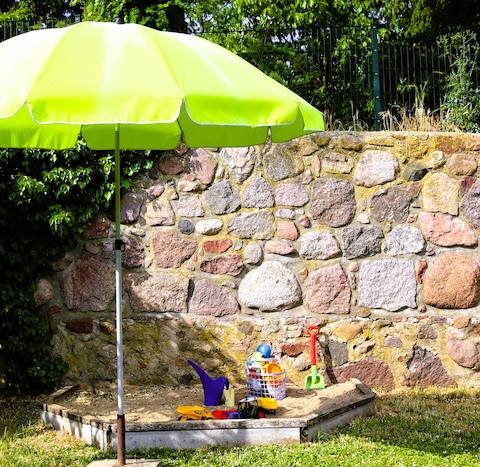 Sandkasten und Spielplatz